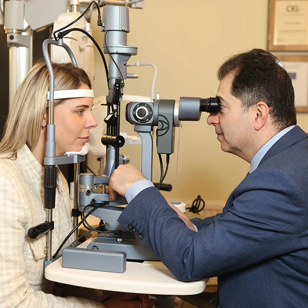 Clinician operating the OptiLight IPL machine