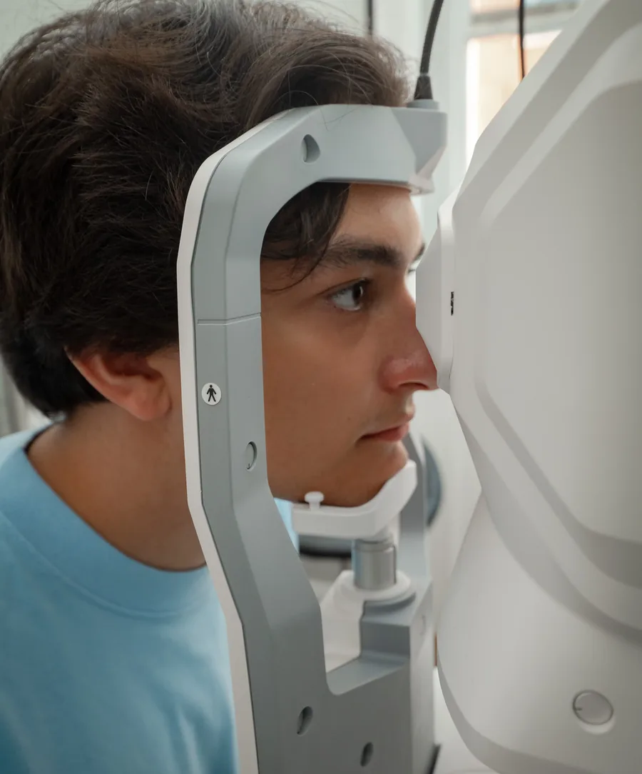 Patient undergoing an ophthalmic examination