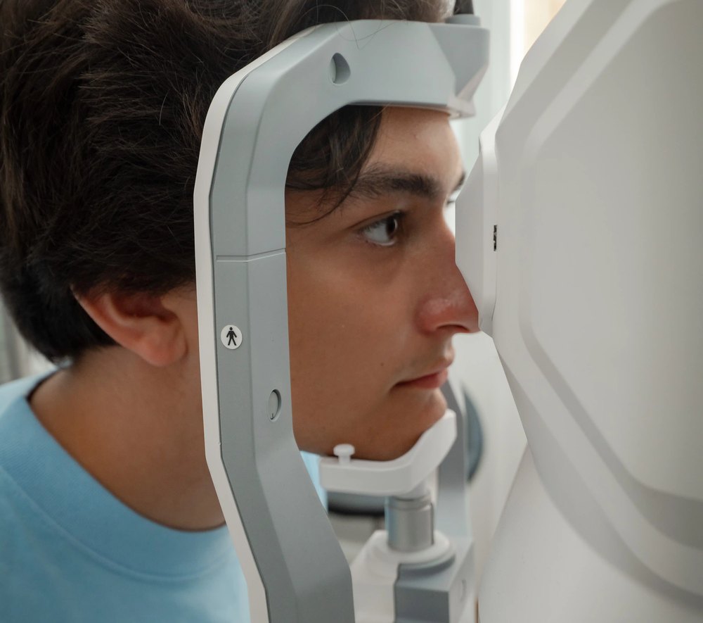 Patient undergoing an ophthalmic examination